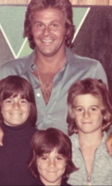Rande Gerber with his father and siblings